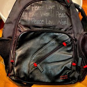 Of back pack many pockets users 3 times.
